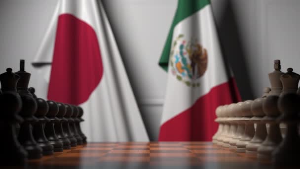 Juego de ajedrez contra banderas de Japón y México. Competencia política relacionada con la animación 3D — Vídeos de Stock