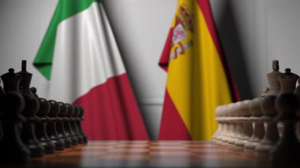 Chess game against flags of Italy and Spain. Political competition related 3D animation — Stock Video