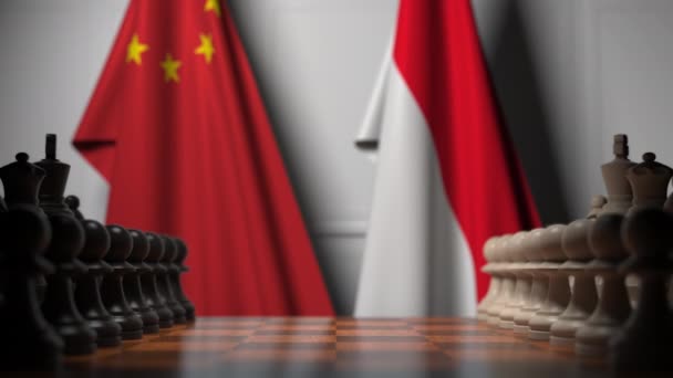 中国とインドネシアの旗に対するチェスゲーム。政治競争関連3Dアニメーション — ストック動画