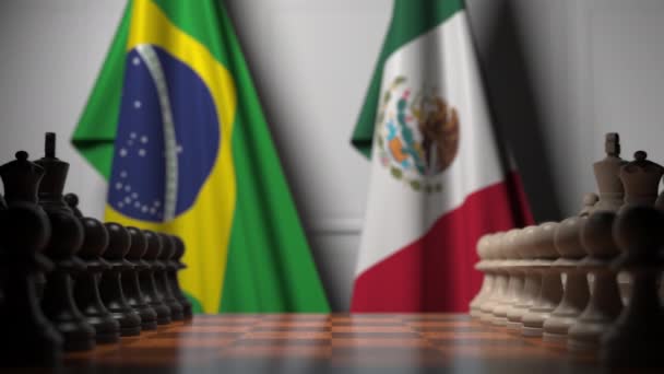 Schaakspel tegen vlaggen van Brazilië en Mexico. Politieke competitie gerelateerde 3D-animatie — Stockvideo