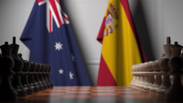 Schachspiel gegen Flaggen Australiens und Spaniens. politische Konkurrenz im Zusammenhang mit 3D-Animation — Stockvideo