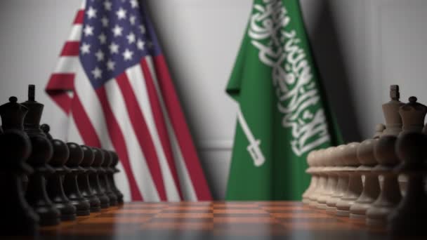 Juego de ajedrez contra banderas de USA y Arabia Saudita. Competencia política relacionada con la animación 3D — Vídeo de stock