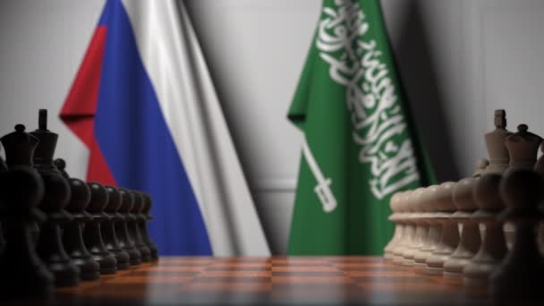 Juego de ajedrez contra banderas de Rusia y Arabia Saudita. Competencia política relacionada con la animación 3D — Vídeo de stock