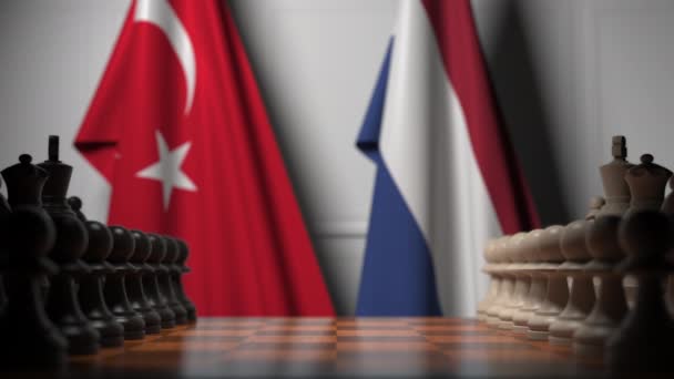 Schachspiel gegen Flaggen der Türkei und der Niederlande. politische Konkurrenz im Zusammenhang mit 3D-Animation — Stockvideo