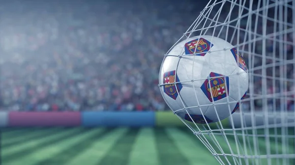 Logotipo do clube de futebol FC Barcelona na bola em rede de futebol. Renderização 3D conceitual editorial — Fotografia de Stock