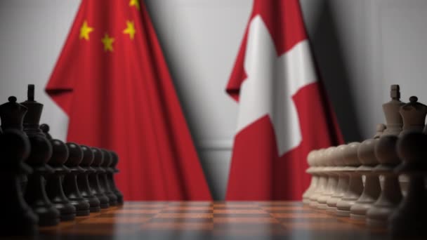 Juego de ajedrez contra banderas de China y Suiza. Competencia política relacionada con la animación 3D — Vídeos de Stock