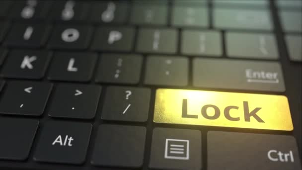 Black computer keyboard and gold lock key. Conceptual 3D animation — Stock Video