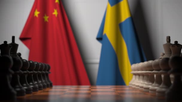 Juego de ajedrez contra banderas de China y Suecia. Competencia política relacionada con la animación 3D — Vídeos de Stock