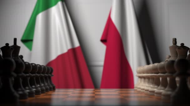 Флаги Италии и Польши за пешками на шахматной доске. Шахматная игра или политическое соперничество — стоковое видео
