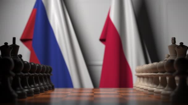 Drapeaux de la Russie et de la Pologne derrière pions sur l'échiquier. Jeu d'échecs ou rivalité politique liée à l'animation 3D — Video