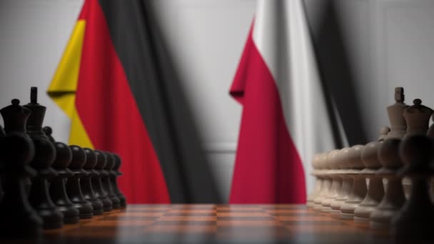 Satranç tahtasındaki piyonların arkasında Almanya ve Polonya bayrakları. Satranç oyunu veya siyasi rekabet ile ilgili 3d animasyon — Stok video