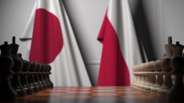 Drapeaux du Japon et de la Pologne derrière des pions sur l'échiquier. Jeu d'échecs ou rivalité politique liée à l'animation 3D — Video