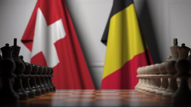 Banderas de Suiza y Bélgica detrás de peones en el tablero de ajedrez. Juego de ajedrez o rivalidad política relacionada con la animación 3D — Vídeo de stock