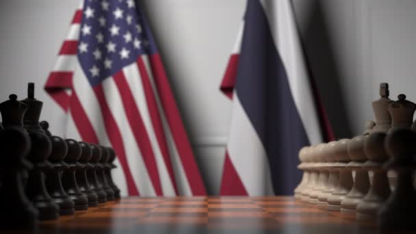 Drapeaux des États-Unis et de la Thaïlande derrière des pions sur l'échiquier. Jeu d'échecs ou rivalité politique liée à l'animation 3D — Video