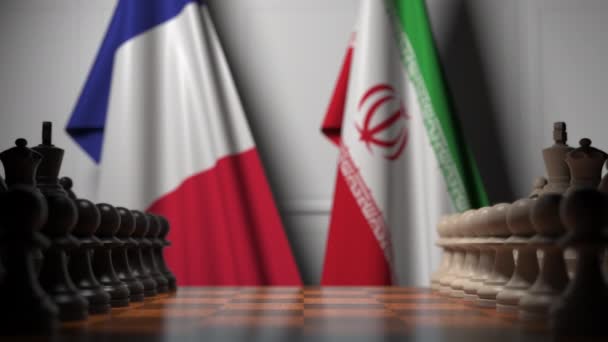 Banderas de Francia e Irán detrás de peones en el tablero. Juego de ajedrez o rivalidad política relacionada con la animación 3D — Vídeos de Stock