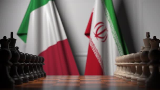 Flags of Italy and Iran behind pawns on the chessboard. Chess game or political rivalry related 3D animation — Stock Video