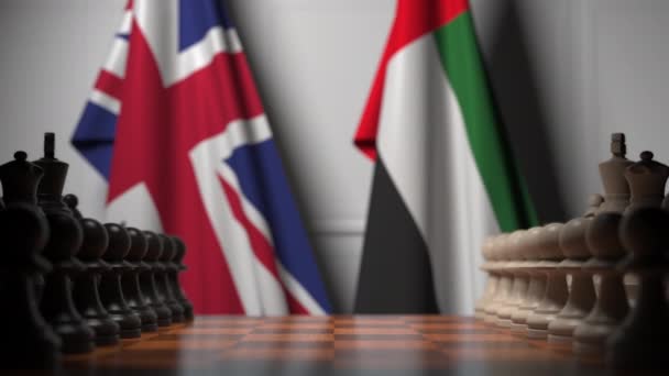 Flaggen von uk und uae hinter Bauern auf dem Schachbrett. Schachspiel oder politische Rivalität im Zusammenhang mit 3D-Animation — Stockvideo