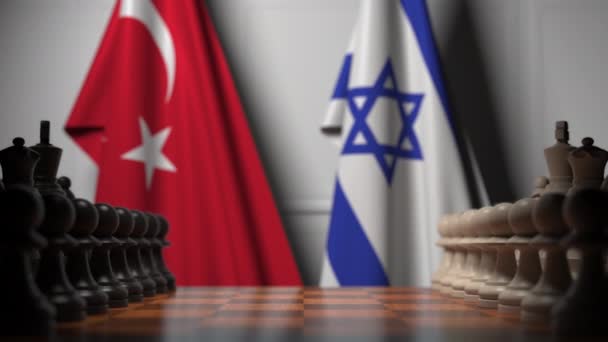 Flags of Turkey and Israel behind pawns on the chessboard. Chess game or political rivalry related 3D animation — Stock Video