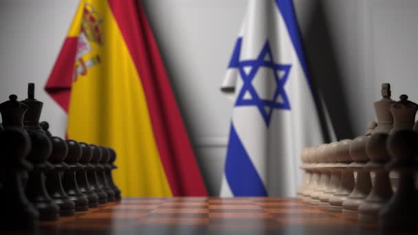 Drapeaux d'Espagne et d'Israël derrière des pions sur l'échiquier. Jeu d'échecs ou rivalité politique liée à l'animation 3D — Video