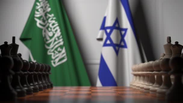 Satranç tahtasındaki piyonların arkasında Suudi Arabistan ve İsrail bayrakları. Satranç oyunu veya siyasi rekabet ile ilgili 3d animasyon — Stok video