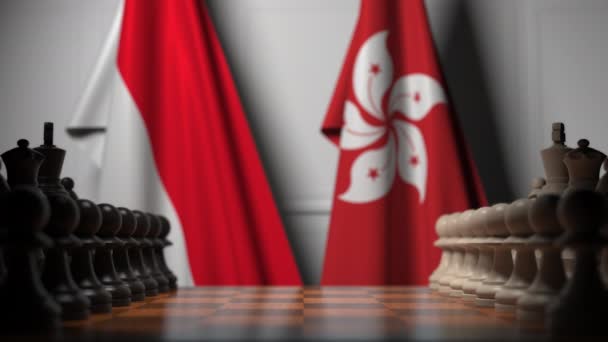 Flagi Indonezji i Hongkongu za pionki na szachach. Gra w szachy lub polityczna rywalizacja związana z animacją 3D — Wideo stockowe