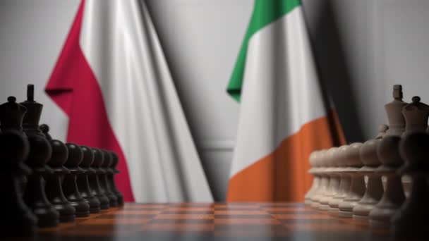 Flags of Poland and Ireland behind pawns on the chessboard. Chess game or political rivalry related 3D animation — Stock Video