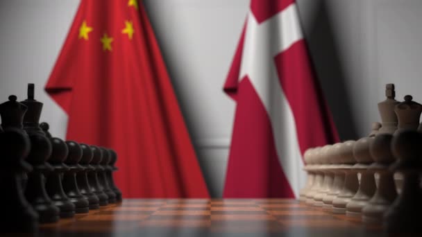Banderas de China y Dinamarca detrás de peones en el tablero de ajedrez. Juego de ajedrez o rivalidad política relacionada con la animación 3D — Vídeos de Stock