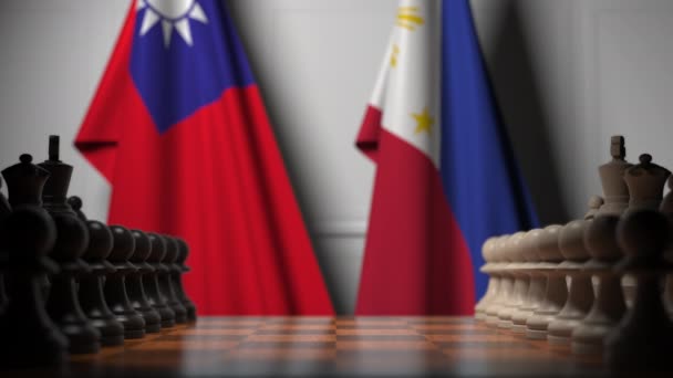 Drapeaux de Taiwan et des Philippines derrière des pions sur l'échiquier. Jeu d'échecs ou rivalité politique liée à l'animation 3D — Video