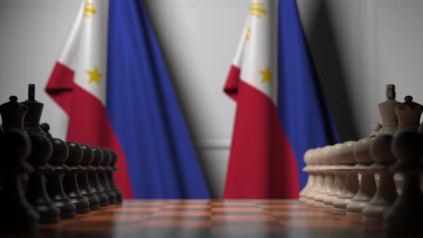 Banderas de Filipinas detrás de peones en el tablero de ajedrez. Juego de ajedrez o rivalidad política relacionada con la animación 3D — Vídeos de Stock