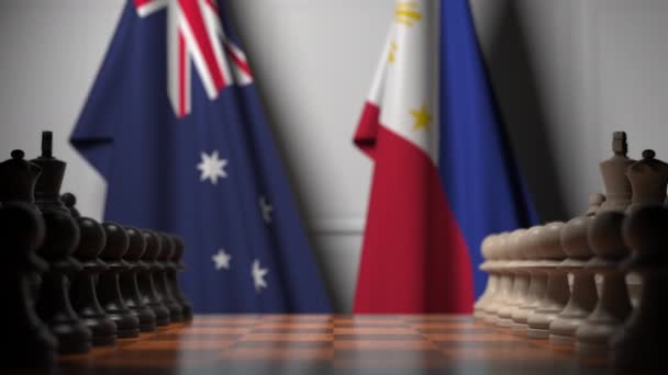 Drapeaux de l'Australie et des Philippines derrière des pions sur l'échiquier. Jeu d'échecs ou rivalité politique liée à l'animation 3D — Video