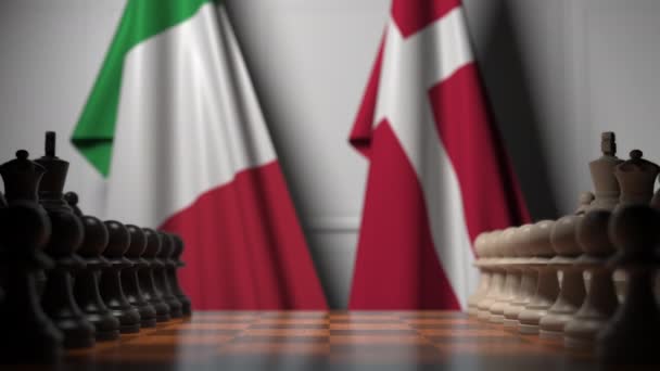 Banderas de Italia y Dinamarca detrás de peones en el tablero de ajedrez. Juego de ajedrez o rivalidad política relacionada con la animación 3D — Vídeo de stock