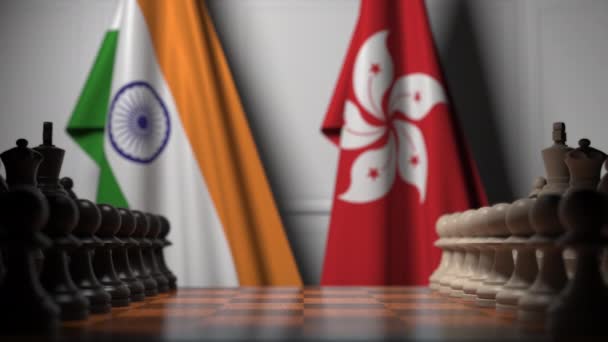 Banderas de la India y Hong Kong detrás de peones en el tablero de ajedrez. Juego de ajedrez o rivalidad política relacionada con la animación 3D — Vídeos de Stock