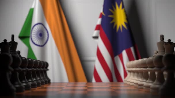 Flaggor i Indien och Malaysia bakom bönder på schackbrädet. Schack spel eller politisk rivalitet relaterade 3D-animering — Stockvideo