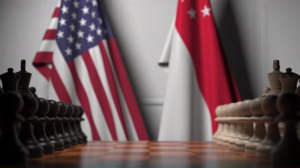 Flaggor i USA och Singapore bakom brickor på schackbrädet. Schack spel eller politisk rivalitet relaterade 3D-animering — Stockvideo