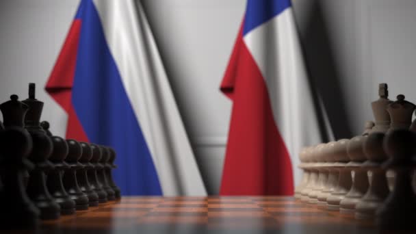 Flags of Russia and Chile behind pawns on the chessboard. Chess game or political rivalry related 3D animation — Stock Video