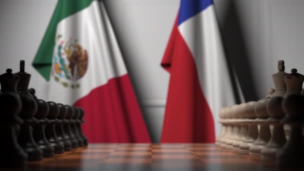 Drapeaux du Mexique et du Chili derrière des pions sur l'échiquier. Jeu d'échecs ou rivalité politique liée à l'animation 3D — Video