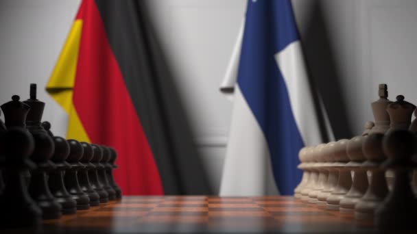 Flags of Germany and Finland behind pawns on the chessboard. Chess game or political rivalry related 3D animation — Stock Video
