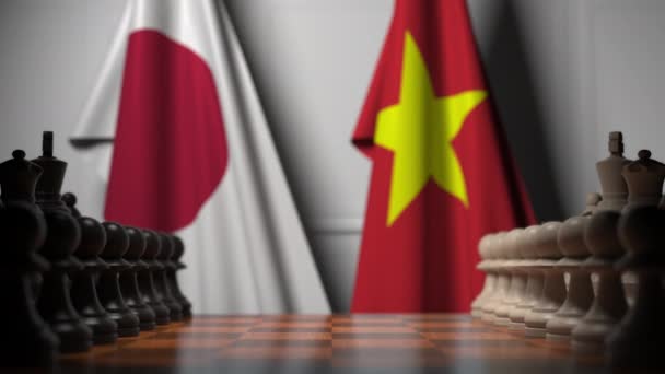Σημαίες της Ιαπωνίας και του Βιετνάμ πίσω από πιόνια στη σκακιέρα. Παιχνίδι σκάκι ή πολιτική αντιπαλότητα σχέση 3D κινούμενα σχέδια — Αρχείο Βίντεο