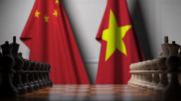 Drapeaux de la Chine et du Vietnam derrière pions sur l'échiquier. Jeu d'échecs ou rivalité politique liée à l'animation 3D — Video