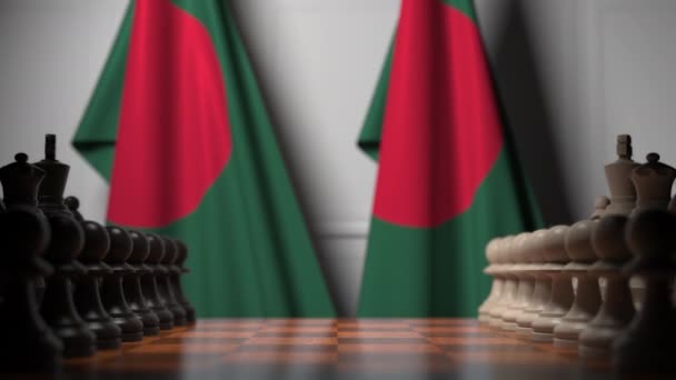 Banderas de Bangladesh detrás de peones en el tablero. Juego de ajedrez o rivalidad política relacionada con la animación 3D — Vídeo de stock