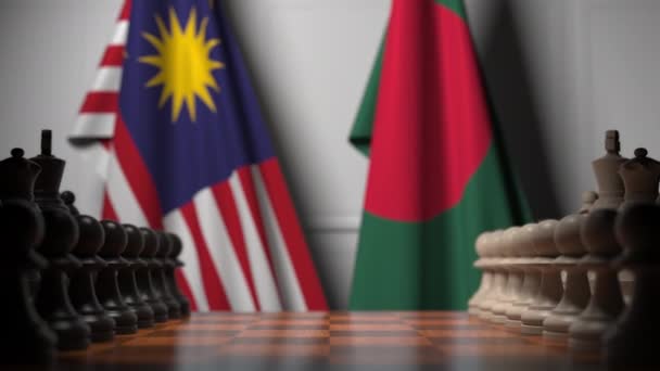 马来西亚和孟加拉国国旗在棋盘上的棋子后面。国际象棋游戏或政治竞争相关3D动画 — 图库视频影像