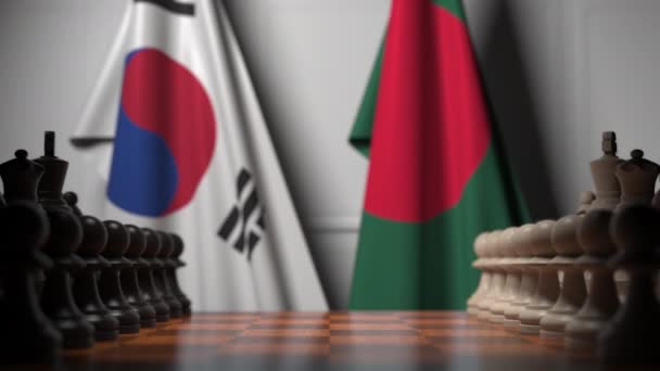 Bandiere della Corea del Sud e Bangladesh dietro pedine sulla scacchiera. Gioco di scacchi o rivalità politica relativi animazione 3D — Video Stock