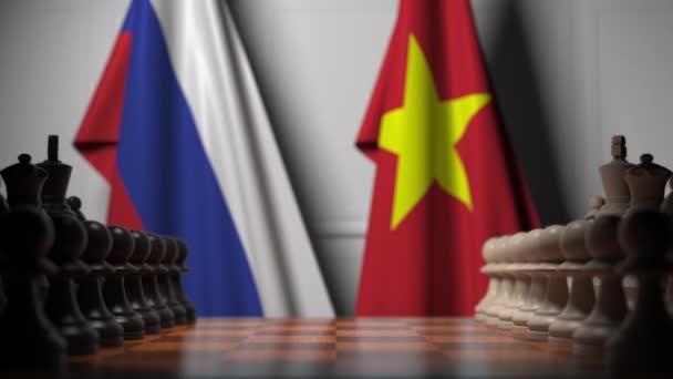 俄罗斯国旗和越南棋盘上的棋子后面。国际象棋游戏或政治竞争相关3D动画 — 图库视频影像