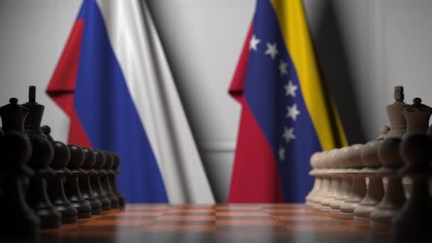 Flags of Russia and Venezuela behind pawns on the chessboard. Chess game or political rivalry related 3D animation — Stock Video