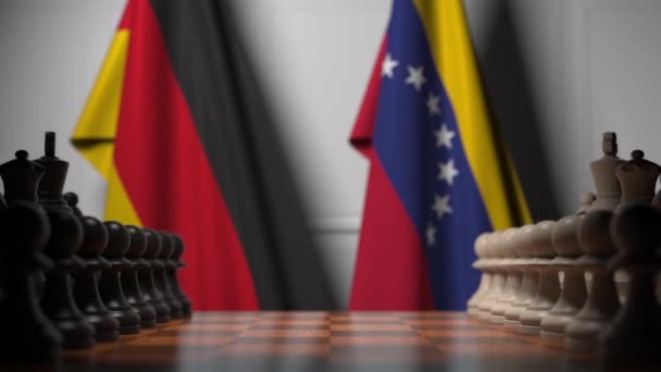 Bandeiras da Alemanha e Venezuela atrás de peões no tabuleiro de xadrez. Jogo de xadrez ou rivalidade política relacionada com animação 3D — Vídeo de Stock