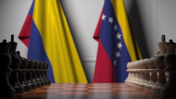 哥伦比亚和委内瑞拉国旗在棋盘上的棋子后面。国际象棋游戏或政治竞争相关3D动画 — 图库视频影像