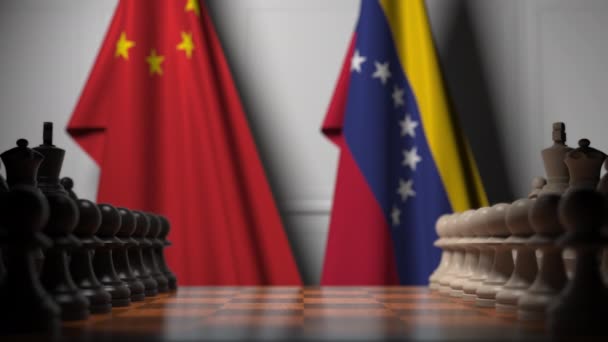 Drapeaux de la Chine et du Venezuela derrière des pions sur l'échiquier. Jeu d'échecs ou rivalité politique liée à l'animation 3D — Video