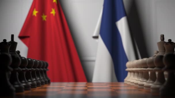 Bandeiras da China e Finlândia atrás de peões no tabuleiro de xadrez. Jogo de xadrez ou rivalidade política relacionada com animação 3D — Vídeo de Stock