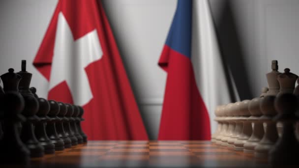 Flaggen der Schweiz und der Tschechischen Republik hinter Bauern auf dem Schachbrett. Schachspiel oder politische Rivalität im Zusammenhang mit 3D-Animation — Stockvideo