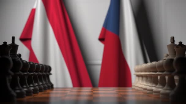 奥地利和捷克共和国的国旗挂在棋盘上的棋子后面。 棋类游戏或政治竞争相关3D动画 — 图库视频影像